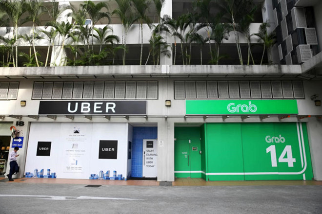 Tin tức - Thương vụ Uber “bán mình” cho Grab bị điều tra do nghi ngờ vi phạm luật cạnh tranh
