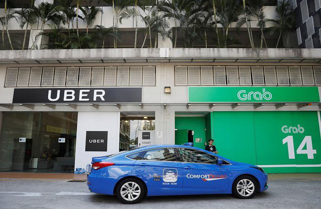 Tin tức - Vụ Grab mua lại Uber: Taxi truyền thống giục Bộ Công Thương sớm ra kết luận 