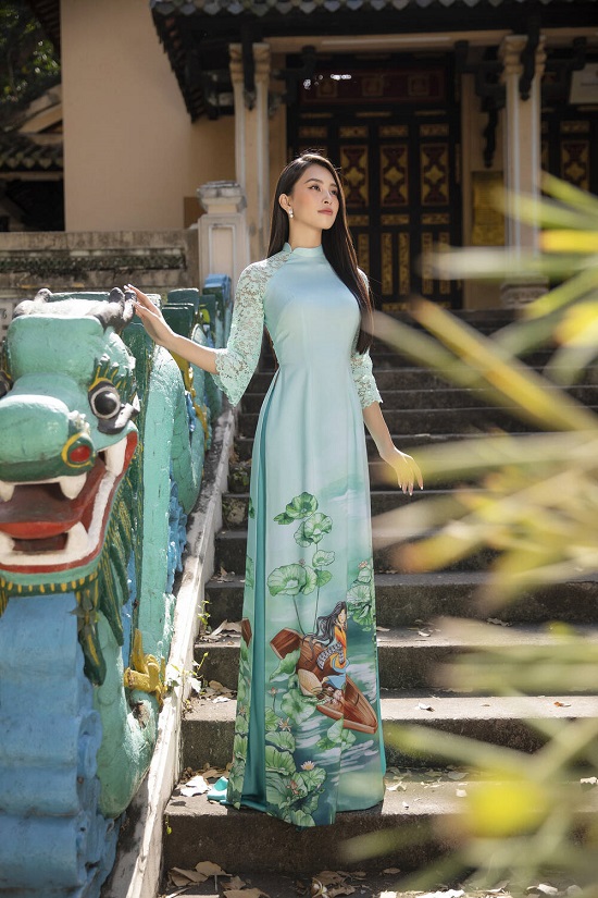 Tin tức giải trí - Hoa hậu Tiểu Vy 'đốn tim' người xem với nụ cười tỏa nắng trong bộ áo dài rực rỡ sắc xuân (Hình 5).