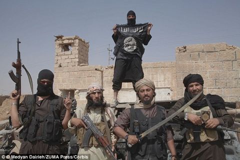IS xử tử hàng loạt thành viên vì tội "bỏ trốn" - Ảnh 1
