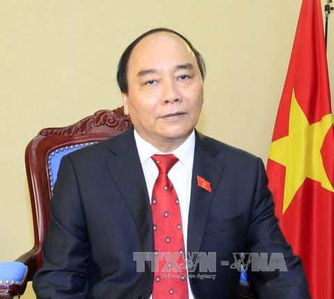 Thủ tướng Nguyễn Xuân Phúc trả lời phỏng vấn trước thềm Hội nghị G7  - Ảnh 1