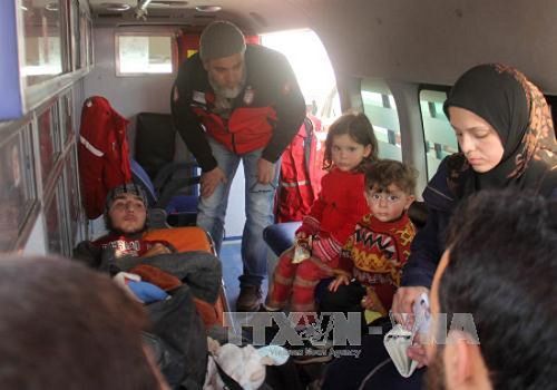 Chính phủ Syria khởi động tiến trình sơ tán người dân ở 4 tỉnh bị bao vây - Ảnh 1
