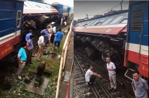 Tàu hỏa chở hơn 100 người từ Lào Cai trật bánh trong ga Yên Viên - Ảnh 1