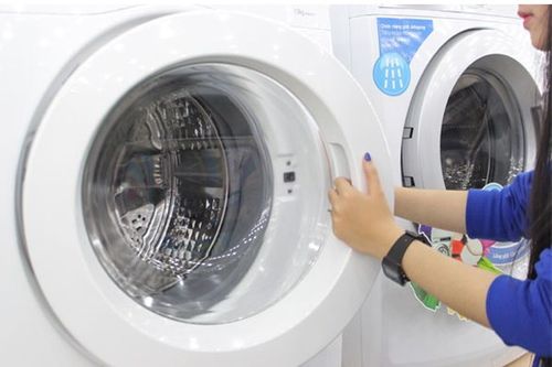 Mẹo sử dụng máy giặt ít tốn điện, nước - Ảnh 2