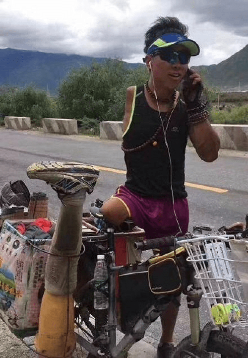 Cảm phục vô cùng người mất 1 chân tay vẫn đạp xe vượt 2.166km đến Tây Tạng - Ảnh 2