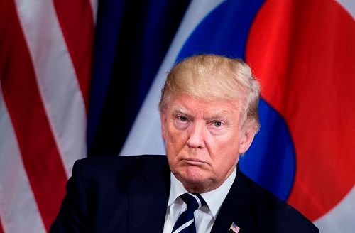 Ông Trump ký lệnh trừng phạt mới với Triều Tiên - Ảnh 1