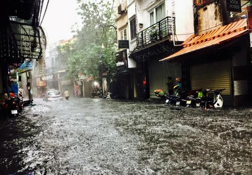 Từ ngày mai, Hà Nội bước vào đợt mưa lớn kéo dài 4 ngày - Ảnh 1