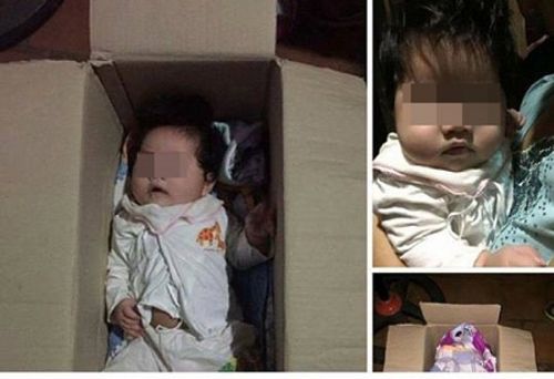 Bé gái 4 tháng tuổi xinh xắn bị bỏ rơi trong thùng giấy ở Hà Nội - Ảnh 1