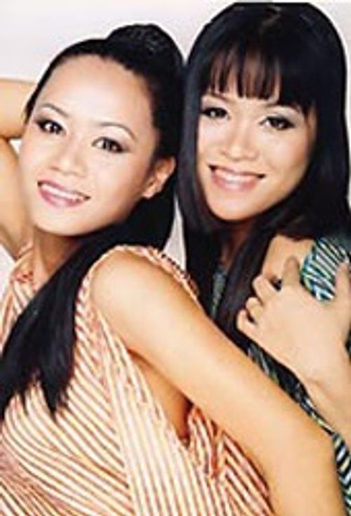 Những cặp chị em song sinh "mười phân vẹn mười" của showbiz Việt - Ảnh 10