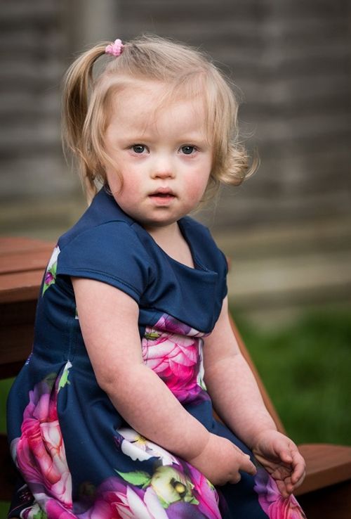 Bé gái 2 tuổi bị Down trở thành mẫu ảnh của nhãn hàng thời trang trẻ em - Ảnh 4