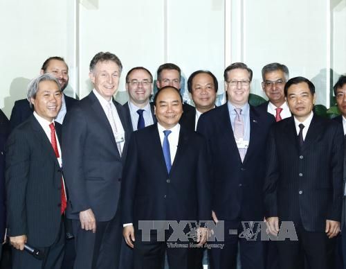 Thủ tướng Nguyễn Xuân Phúc tọa đàm với các doanh nghiệp hàng đầu thế giới - Ảnh 1