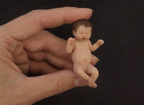 Ngỡ ngàng trước hình ảnh những em bé sơ sinh nhỏ hơn cả bàn tay siêu đáng yêu - Ảnh 7