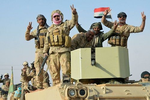 Iraq, Iran cùng tuyên bố đánh bại IS - Ảnh 1