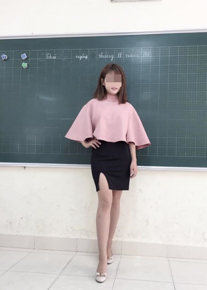 Nữ giáo viên tiểu học diện "váy ngắn xẻ cao" gây xôn xao - Ảnh 2