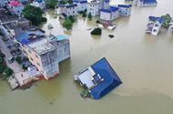 Tin thế giới - Trung Quốc chật vật ứng phó với lũ lụt nghiêm trọng nhất trong 3 thập kỷ
