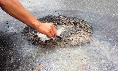 Tiếp tục xuất hiện hóa chất “lạ” phá hủy mặt đường tại Quảng Bình