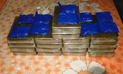 Bắt 2 người Lào vận chuyển 20 bánh heroin và 5.000 viên ma tuý