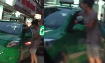 Clip: Người đàn bà đánh nhau với lái xe taxi gây tắc đường