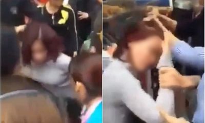 Cô gái trẻ bị dân vây đánh vì trộm iPhone 6 ở chợ Ninh Hiệp