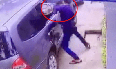 Video: Dùng bugi xe máy đập vỡ kính ôtô, trộm túi xách trong 3 giây