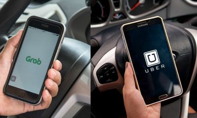 TP.HCM yêu cầu Uber và Grab tạm dừng kết nối xe mới
