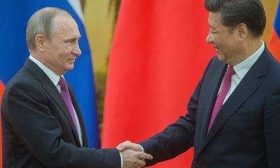 Hai nhà lãnh đạo Nga và Trung Quốc thảo luận về tình hình Triều Tiên bên lề APEC