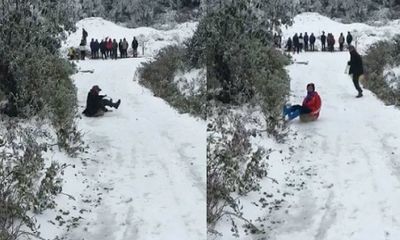 Video: Tuyết phủ trắng Sapa, người dân vui thích chơi trượt tuyết
