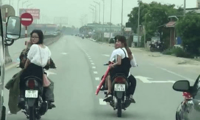 Nhóm thanh niên đầu trần, dàn hàng chặn xe trên quốc lộ để rước dâu gây bức xúc
