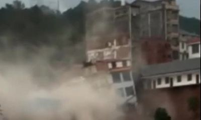 Trung Quốc: Kinh hoàng khoảnh khắc 6 tòa nhà cao tầng đổ sập vì mưa lũ