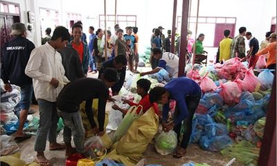 Dầm mưa, vượt lũ cứu người và bữa cơm thắm tình hữu nghị trên nước bạn Lào