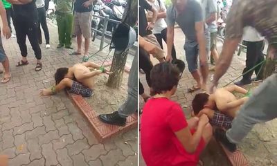 Hà Nội: Thiếu niên đánh giày bị trói tay chân vào gốc cây gần công viên Thống Nhất
