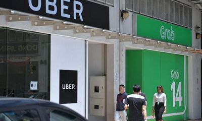 Grab, Uber bị phạt 9,5 triệu USD vì vụ sáp nhập ở Singapore 