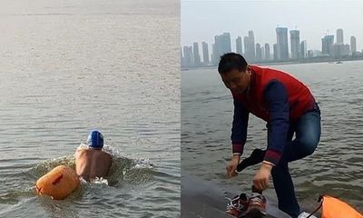 Kỳ lạ CEO Trung Quốc bơi qua sông đi làm suốt 11 năm