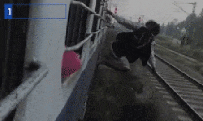 Liều lĩnh nhoài người ra ngoài tàu chạy để quay phim, người đàn ông nhận cái kết đắng