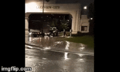 Video: Nhóm bảo vệ đánh tới tấp, kéo lê nam tài xế xe tải ngáo đá giữa trời mưa to