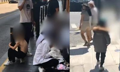 Trung Quốc: Phản cảm cảnh người mẫu nhí phải mặc đồ đông giữa nắng nóng gay gắt
