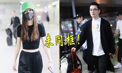 Huỳnh Hiểu Minh và Angelababy cùng xuất hiện ở sân bay nhưng phớt lờ khi được hỏi về nhau