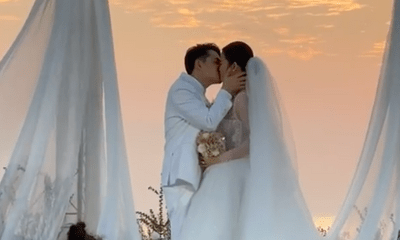 Ông Cao Thắng và Đông Nhi trao nhẫn cưới, khoá môi nồng cháy trước 500 khách mời