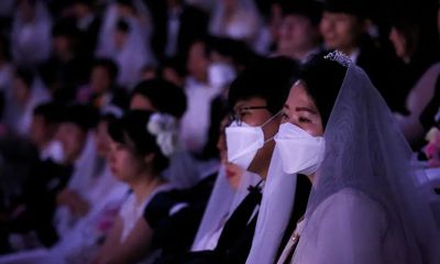 Những hình ảnh đáng kinh ngạc về đám cưới tập thể của 6.000 cặp đôi giữa thời virus corona