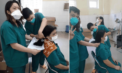 Câu chuyện cảm động đằng sau bức ảnh nữ y bác sĩ Đà Nẵng cắt tóc để lên tuyến đầu chống dịch