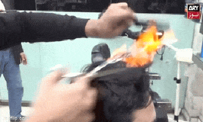Video: Choáng với màn cắt tóc bằng lửa, búa, thủy tinh và dao chặt thịt