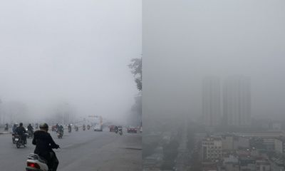 Sương mù dày đặc tiếp tục bao phủ khắp Hà Nội, người dân ra đường gặp nhiều khó khắn