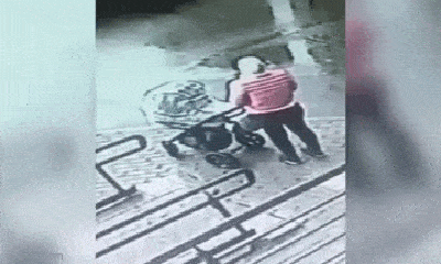 Video - Clip: Thót tim cảnh hai mẹ con bị cửa kính rơi trúng trên đường