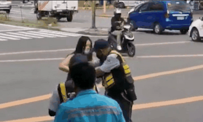 Clip: Người phụ nữ nhổ nước bọt, tấn công cảnh sát gây bức xúc 