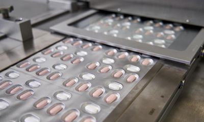 Pfizer đồng ý chia sẻ công thức sản xuất thuốc điều trị COVID-19