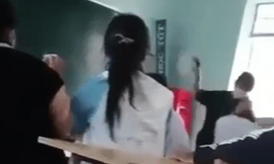Giáo dục pháp luật - Thầy giáo ngồi im khi nữ sinh dùng mũ bảo hiểm đánh bạn: Nhà trường nói gì?