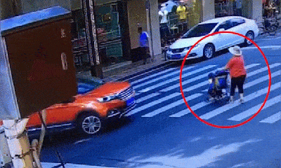 Video: Ô tô đâm trúng xe đẩy, bé trai thoát nạn thần kỳ