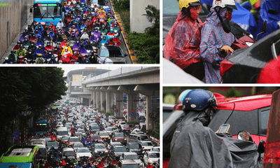 Người dân Thủ đô chật vật trong cảnh tắc đường, xe cộ nhích từng mét trong mưa rét