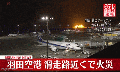 Máy bay chở gần 400 khách của Nhật Bản bốc cháy trên đường băng ở Tokyo