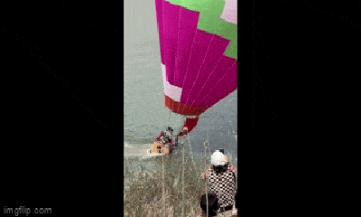 Video: Khinh khí cầu chở 7 du khách bất ngờ lao xuống hồ nước